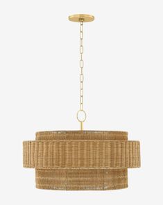 a chandelier made out of wicker hanging from a chain on a white background