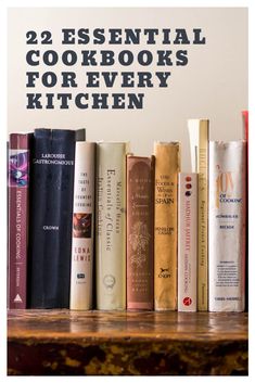 books lined up on a shelf with the title 22 essential cookbooks for every kitchen