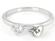 Pre-Owned 0.35ct Round White Zircon Rhodium Over Sterling Silver Heart Charm Initial "M" Ring. Measures Approximately 0.19"L x 0.19"W. Not Sizeable. .  This product may be a customer return, vendor sample, or on-air display and is not in its originally manufactured condition.  It may not be new.  In some instances, these items are repackaged by JTV. Vs Clarity Round Cut Initial Ring For Anniversary, Anniversary Initial Ring With Vs Clarity Round Cut, Round Initial Ring With Prong Setting For Anniversary, Anniversary Initial Ring With Prong Setting, Anniversary Initial Ring With Brilliant Round Cut, Silver Heart Cut Single Diamond Ring, Silver Heart Cut Ring With Single Diamond, White Gold Initial Ring With Brilliant Cut For Promise, White Gold Heart Ring With Single Diamond