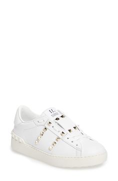 Goldtone pyramid studs add a flash of signature glamour to a lace-up sneaker that instantly elevates your street-style game. Style Name:Valentino Garavani Rockstud Sneaker (Women). Style Number: 5142148. Available in stores. Luxury Studded Platform Sneakers With White Sole, Luxury Low-top Platform Sneakers With Studded Outsoles, Luxury Leather Platform Sneakers With Studded Outsoles, Designer High-top Sneakers With Studded Outsoles, Casual Studded Lace-up Sneakers, Studded Lace-up Sneakers For Streetwear, White Low-top Sneakers With Spikes, Luxury Studded Lace-up Sneakers, Low-top Studded Sneakers For Streetwear