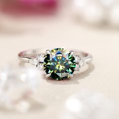 Teal Color Moissanite Ring, 18k Gold Vermeil 925 Sterling Silver Ring, Engagement Ring, Handmade Solitaire Ring, Wedding Ring, Gift For Her (in stock) - Metal: 925 Sterling Silver - Custom Color: Rose Gold Plated, Yellow Gold Plated, and White Gold Plated - Gross weight: 2.75g - Gemstones: Moissanite - Moissanite CTW: 1.35 (1pcs) - Moissanite size: 6.6 mm - Ring size: 7 - Ring Width: 20.91mm Approximately - Ring Height: 25.57mm Approximate Hello! Thank you for visiting my shop! Please feel free Green Moissanite Rings For Promise, Green Topaz Ring With Diamond Accent, Green Moissanite Promise Ring, Green Diamond Topaz Ring, Green Round Topaz Ring For Anniversary, Green Topaz Ring For Anniversary, Green Round Cut Topaz Ring For Anniversary, Green Moissanite Rings For Gifts, Dazzling Round Moissanite Emerald Ring