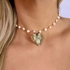 Are you looking for the perfect pearl locket necklace for someone special this spring-summer season? Or a unique and handmade bronze heart necklace for everyday wear to spoil yourself? Made with 18K gold filled stainless steel wire, dainty freshwater pearls and antique bronze lockets, my antique heart locket pendant is the perfect compliment to any outfit idea! My antique locket necklace is a great gift idea for any special occasion to all the women in your life. You can't go wrong when gifting Unique Locket Necklace Pearl, Pearl Heart Necklace, Pearl Locket, Necklace For Everyday, Locket Necklace Vintage, Real Pearl Necklace, Antique Locket, Vintage Lockets, Pearl Heart