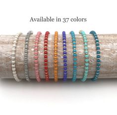 Minimalist boho stretch anklets/bracelet made of miyuki seed beads alternated with gold or silver miyuki beads. Miyuki is a Japanese brand known for its beautiful colors and high quality. Because the color has already been mixed in the bead, the colors remain beautiful! Choice of 37 colors (see selection screen). Nice to mix and match with each other and all other anklets and bracelets in this shop. Materials: *High quality elastic * Miyuki seed beads: in different colors - 3 mm * Miyuki seed beads: gold or silver - 2 mm Size anklets/bracelets can be ordered in: * 15 cm to 26 cm NO MEASURING TAPE IN THE HOUSE? Use a piece of string and place it next to a ruler. Measure your size and add 0.5 cm, then you are always right. TIPS FOR MAINTAINING YOUR JEWELERY: * do not stretch the bracelet/ank Heishi Beaded Bracelets For Everyday Summer Wear, Everyday Heishi Beads Bracelet For Summer, Everyday Heishi Beads Friendship Bracelets For Summer, Hand-strung Beaded Bracelets For Everyday Summer, Everyday Summer Beaded Bracelets, Summer Friendship Bracelets With Heishi And Spacer Beads, Minimalist Round Bead Bracelets For Beach, Minimalist Round Beads Bracelets For Beach, Minimalist Hand-strung Beaded Bracelets For Beach