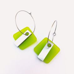 Geometric green neon acrylic hoops earrings. These cheerful, colorful and light earrings are the ideal complement for this summer because they are very flattering. You can choose the material of the earrings between stainless steel or silver. The hoops measure 3 cm. The charms, 22 x 22 mm. You can combine these earrings with this necklace: https://edathings.etsy.com/listing/1550736646 --------- MATERIALS STAINLESS STEEL EARRINGS To protect the overall quality and color of your stainless steel je Hoops With Charms, Wear Perfume, Green Neon, Light Earrings, Hoops Earrings, Steel Earrings, Lightweight Earrings, Light Weight Earrings, Stainless Steel Earrings