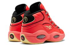 The Reebok Hot Ones x Question Mid 'The Last Dab' is the perfect sneaker for those who like to spice up their life! This special-edition colorway of Allen Iverson's debut signature shoe is a fiery red, in honor of the YouTube series that forces celebrities to consume scorching-hot chicken wings. Unique details include a woven Scoville scale tag atop the mesh tongue and a gold Hot Ones logo on the black suede heel tab. Not only is this sneaker super stylish, but it's also comfortable and supporti Allen Iverson Shoes, Hot Chicken Wings, Hot Ones, Perfect Sneakers, Allen Iverson, Sneaker Release, Black Suede Heels, Fiery Red, Round Toe Heels