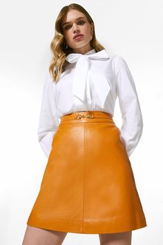 Buckle Up And Meet Your New Favourite Leather Skirt. Crafted In An Ever-Flattering A-Line Shape, This Mini Is Detailed With A Glossy Snaffle Trim That'Ll Draw The Eye In At The Waist. Designed In Our Signature High-Quality Leather, It'Ll Give The Simplest Of Looks An Ultra-Luxurious Feel. Chic Skirt With Belt Detail, Mini Length, Fitted Mini Skirt With Belt Detail, Fitted Leather Mini Skirt With Belt Loops, Leather Mini Skirt With Belt Loops, Luxury A-line Mini Skirt, Feminine Office, Office Skirt, Faux Leather Pencil Skirt, Pencil Skirt Work