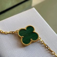 Add a touch of elegance to your look with our Clover Bracelet featuring 5 stunning motifs of malachite and gold. The perfect accessory for any occasion, this bracelet will bring you good luck and fortune wherever you go. Elevate your style with this beautiful and meaningful piece. ADDITIONAL INFORMATION Color: Pink Gold Stone: Malachite Ref. od903 Material:- 925 Sterling Silver - 18k Gold Plated- 18k Real Gold ( contact us via instagram) Length: 19 cm Our replica products are committed to qualit Luxury Green 14k Gold Bracelets, Luxury Gold Plated Gemstone Bracelets, Elegant Gold Malachite Jewelry, Luxury Gold Bracelets With Gemstones, Gold Malachite Bracelet, Luxury Green Gold Bracelet As A Gift, Luxury Green Gold Bracelet For Gift, Elegant Malachite Bracelet Jewelry, Elegant Malachite Bracelet