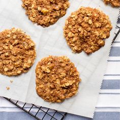 oatmeal cookies sitting on top of a cooling rack