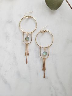 The Solstice Earrings in Moonstone have been a top seller that I decided to design them with Labradorite as well! These beauties are light weight and you can wear them as an everyday earring or take them out on a special night. They are very versatile. Each piece is handmade with your choice of 14K Gold Filled or Sterling Silver. The length of the earrings are just over 3 in. Labradorite is a natural stone and the color may slightly vary. You can see the colors in the 4th picture. Thank you for Minimalist Brass Earrings With Natural Stones, Labradorite Drop Earrings With Natural Stones, Nickel-free Labradorite Drop Earrings, Labradorite Dangle Earrings For Pierced Ears, Everyday Dangle Earrings With Natural Stones, Adjustable Dangle Labradorite Earrings, Adjustable Labradorite Dangle Earrings, Nickel-free Labradorite Dangle Earrings, Handmade Labradorite Earrings For Everyday