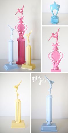 four different colored vases with statues on them and one is pink, blue, yellow, and white