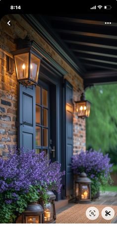 an outdoor porch with purple flowers and lanterns