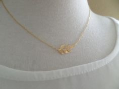 Leaf necklace in Gold Silver or Rose by TiffanyAvenueBridal Delicate Necklace With Simple Design For Gifts, Delicate Simple Necklace For Gift, Delicate Simple Design Necklace For Gift, Dainty Simple Design Necklace As Gift, Simple Rose Gold Jewelry For Bridesmaid Gift, Dainty Charm Necklaces With Simple Design For Gifts, Simple Necklaces With Delicate Chain For Bridesmaid Gift, Simple Delicate Chain Necklace For Bridesmaid Gift, Simple Bridesmaid Necklace With Delicate Chain