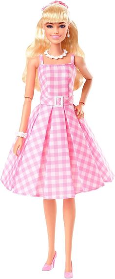 a barbie doll wearing a pink and white checkered dress