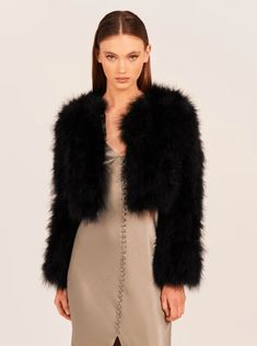 Whether you are looking to make a style statement at your next bash or are on the hunt for the perfect cover up for your wedding dress, it truly doesn’t get much better than this bomber style feather jacket! Available in white or blush Cropped design Handmade with Marabou Feathers Satin Lining Optional hook & eye closure Lightweight Jacket Over Dress, Outer Satin, Cropped Fur Jacket, Black Fur Jacket, Tan Trousers, Feather Jacket, Winter Must Haves, Strong Shoulders, Cool Jackets