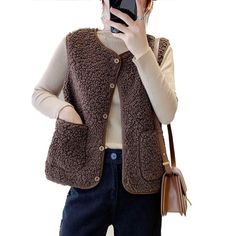 Product Description * Item:Women Waistcoat Gilet Coat Vest Jacket Winter Warm Button Fleece Sleeveless Size * Condition: 100% Brand New * Color:apricot.coffee.khaki * Size:Asian S-3XL * Package:1pc (without any accessories ）    Please note: 1.Please allow a little error due to manual measurement. 2.The color maybe a little difference because of the light,screen reflection etc. 3.If you are not sure what size to choose, you can tell us your height and weight, we will recommend the right size for you. Shipping 1. Your Item(s) will be shipped within 5-15 business days once payment received. 2. Standard shipping to US/UK,you may can get it in 10-20 Business days.   Standard Shipping for Airmail via Post Office 11-30 business Days Come(approximately within 30 days) ship to other country. 3.if y Winter Khaki Vest, Brown Winter Vest Outerwear, Brown Sweater Vest With Pockets For Fall, Brown Buttoned Vest For Winter, Brown Winter Vest With Buttons, Brown Buttoned Sweater Vest For Fall, Beige Vest With Button Closure For Fall, Beige Button Closure Vest For Fall, Fall Beige Sweater Vest With Buttons