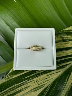 Vintage 14k Solid Gold Dome/ Shrimp Ring Description: This vintage 14k solid gold dome ring, also known as a shrimp ring, features detailed ridges on top. Weighing 3.5 grams and sized at 6 (sizable), this ring is a unique and stylish addition to any jewelry collection. This piece, like all our jewelry, is a rare find—once it's gone, it's gone. Choosing this piece is a win-win: You'll stand out from the crowd and help the environment by shopping sustainably! Why You'll Love It: Bold Design: The dome shape and detailed ridges make a bold statement. Versatile Fit: The ring is sizable, allowing for a perfect fit. Rare and Exclusive: Our pieces are often one-of-a-kind. Don’t miss this exclusive item. Details: Material: 14k Solid Gold Weight: 3.5 grams Size: 6 (sizable) Style: Bold, Unique Perfe Heirloom Oval Dome Promise Ring, Heirloom 14k Gold Round Snake Ring, Oval 14k Stamped Dome Ring For Wedding, Heirloom Yellow Gold Dome Ring For Promise, Yellow Gold Dome Wedding Ring Stamped 14k, 14k Gold Hallmarked Dome Ring For Promise, Heirloom Yellow Gold Dome Promise Ring, 14k Stamped Dome Ring For Anniversary, Oval 14k Gold Dome Ring