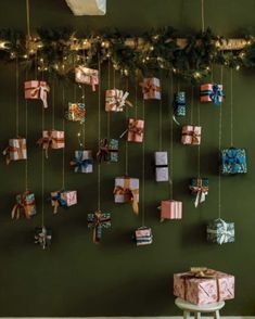 christmas presents hanging on the wall with lights