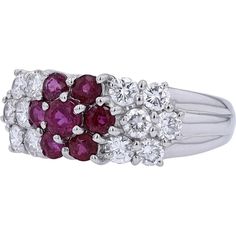 Admire the allure of artistry in this Platinum 900 1.03 Carat Ruby Cluster Ring, a true masterpiece that captivates with its timeless elegance and vintage charm. The main stone, a vibrant ruby weighing 1.03 Carats, is the heart of this ring, exuding passion and sophistication with its rich red hue. Surrounding the ruby are sparkling diamonds totaling 0.78 Carats, adding a touch of glamour and brilliance to the design.Crafted in Platinum 900, this ring not only showcases exquisite craftsmanship but also symbolizes enduring love and commitment. The intricate cluster setting enhances the beauty of each gemstone, creating a harmonious and luxurious look that is perfect for any special occasion or as a meaningful gift for a loved one.Indulge in the luxury of fine jewelry with this stunning ruby Classic Multi-stone Round Cut Diamond Ring, Classic Red Cluster Diamond Ring, Classic Ruby Diamond Multi-stone Ring, Classic Multi-stone Platinum Diamond Ring, Classic Multi-stone Diamond Ring For Formal Occasions, Formal Classic Multi-stone Diamond Ring, Classic Multi-stone Cluster Ruby Ring, Classic Ruby Ring With Brilliant Cut, Classic Multi-stone Cluster Diamond Ring