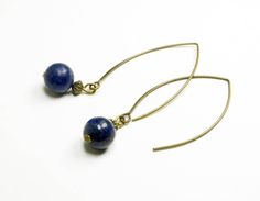 Lapis lazuli earrings (diameter : 1 cm) with long bronze colored hooks  Hook length : 4 cm (1,6 in) Bronze antique french jewelry. I sell matching jewelry in the shop. https://www.etsy.com/fr/shop/FrancoiseCreations?ref=seller-platform-mcnav&section_id=22246824 ♡Hand-made jewelry♡ without lead, without nickel. All my jewelry is lovely packaged . That would make a nice gift. They are all created by myself in my workshop near Paris, in Rueil-Malmaison. Please have a look to my shop : http://www.etsy.com/shop/francoisecreations Blue Beaded Dangle Earrings In Brass, Blue Beaded Brass Dangle Earrings, Blue Dangle Beaded Brass Earrings, Blue Brass Beaded Dangle Earrings, Blue Beaded Brass Earrings As Gift, Gift Blue Beaded Brass Earrings, Blue Beaded Brass Earrings With Ear Wire, Blue Brass Beaded Earrings With Ear Wire, Blue Brass Jewelry With Ear Wire