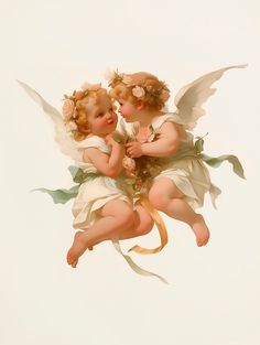 two cherubs with flowers on their heads and wings