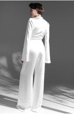 style: vogueWaist type: High waistPopular elements: zipperColor classification: whiteSleeve type: routineThe dress is long: Long style: deep V-collarMaterial composition: Polyester100% White Wide Leg Pants For Evening, White High Waist Wide Leg Evening Pants, White High Waist Wide Leg Pants For Evening, Elegant White Long Sleeve Jumpsuit, Chic White High Waist Dress, Chic White Wide Leg Pants For Evening, Chic White High-waist Dress, Chic High Waist White Dress, White Long Sleeve Jumpsuits For Evening