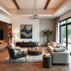 a living room filled with furniture and a flat screen tv on top of a wooden floor