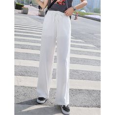 Season:Summer,Spring; Fabric:Polyester; Gender:Women's; Style:Streetwear,Fashion; Elasticity:Micro-elastic; Occasion:Going out,Daily,Street,Vacation,Daily Wear; Function:Breathability,Comfort,Soft,Comfortable; Waistline:High Waist; Pattern:Plain; Design:Elastic Waist,Pocket; Pants Type:Wide Leg,Pants Trousers; Front page:FF; Listing Date:07/05/2023; Production mode:External procurement; Hips:null; Length:; Waist:; Pants Length:Full Length Pants Silhouette, Pocket Stitching, Streetwear Pants, Streetwear Mode, Womens Wide Leg Pants, Winter Pants, Plain Style, High Waist Fashion, Summer Pants