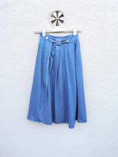 Vintage 90s Belfe Women's Denim Wrap Skirt. Unique, maxi-long blue jeans skirt, minimal signs of wearing  in very good condition. Size on tag: USA- 6 ; B-NL-F - 38 ; A-D-CH-S-N-DK - 36 Estimated fit: Extra Small and Small  due to 2 button fastening , that can be adjusted (please check  measures for perfect fit ) Material: 60% viscose, 40% cotton Condition: 8/10 Flat Measures  Waist(seam to seam): 33 cm - 36cm  - 13'' - 14'' Length: 77 cm - 30''  Add my store to Favorites and Follow my Shop for n Blue Denim Full-length Maxi Skirt, Wide Leg Denim Skirt In Blue, Full Length Blue Denim Skirt, Denim Blue Full-length Maxi Skirt For Summer, Spring Denim Maxi Skirt In Blue, Denim Blue Full Length Maxi Skirt For Summer, Blue High Rise Maxi Skirt For Spring, High-rise Blue Denim Maxi Skirt, Blue Denim Maxi Skirt For Spring