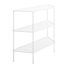 a white shelf with three shelves on each side