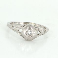 Vintage Art Deco Diamond Filigree Ring 14 Karat White Gold Estate Fine Jewelry 8 Engraved White Gold Diamond Ring In Platinum, Engraved White Gold Filigree Ring, Antique White Gold Jewelry With Single Diamond, Classic Engraved White Gold Filigree Ring, Vintage Engraved Diamond Ring For Formal Occasions, Engraved Platinum Diamond Ring, Vintage White Gold Filigree Ring In 14k, Vintage Silver Diamond Ring With Engraving, Vintage 14k White Gold Filigree Ring With Diamond Cut