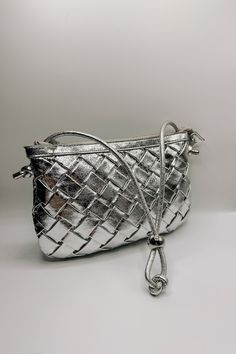 Regina Silver Woven Purse- front view Silver Evening Bag With Zipper Closure, Metallic Evening Shoulder Bag With Zipper Closure, Silver Shoulder Bag With Zipper Closure For Evening, Silver Evening Shoulder Bag With Zipper Closure, Metallic Shoulder Bag For Evening With Zipper, Silver Evening Shoulder Bag With Zipper, Silver Party Shoulder Bag With Adjustable Strap, Silver Shoulder Bag With Adjustable Strap For Evening, Woven Purse