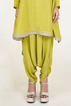 Lime green kurta featuring lace, cutwork and coin detailing around the neckline and bottom hem. Paired with a solid draped dhoti pant. - Aza Fashions Kurta Patterns, Dhoti Pants, Cut Work, Embroidered Silk, Embroidered Lace, Set For Women, Aza Fashion, Full Sleeve, Lime Green