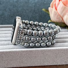 Unique accessory: Apple Watch bracelet featuring natural stone beads, personalized for a distinctive touch. Silver Stainless Steel Beaded Bracelets, Silver Beaded Bracelets With Round Beads, Adjustable Round Metal Watch Bands, Adjustable Silver Bracelet Watch Bands, Silver Stainless Steel Beaded Bracelets With Round Beads, Silver Bracelet Shaped Watch Bands, Adjustable Silver Bracelet Apple Watch Band, Handmade Adjustable Silver Apple Watch Band, Elegant Adjustable Beaded Watch Bands