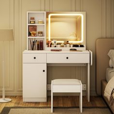 a white desk with a mirror and lights on it in a room next to a bed