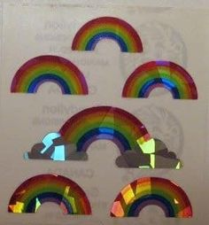 several rainbows are shown in the shape of cutouts