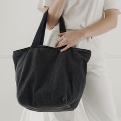 Diso This Baggu Black Washed Denim Canvas Tote Bag!!! It’s An Older Style With A Similar Look To A Mini Cloud Bag That Has An Inner Pocket, Zipper Closure And Thick Straps - Willing To Purchase Or I Have Other Baggu Items Uft Black Cotton Canvas Bag For On-the-go, Casual Black Canvas Bag For On-the-go, Casual Denim Shoulder Bag With Dust Bag, Chic Black Canvas Bag For On-the-go, Chic Black Canvas Bag With Dust Bag, Versatile Denim Bag, Denim Bag For Everyday, Black Denim Travel Shoulder Bag, Versatile Everyday Denim Bag