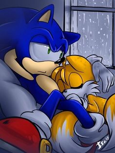 sonic the hedge hugging his stuffed animal friend