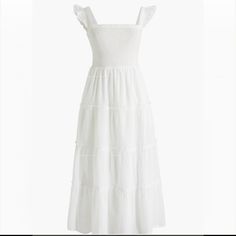 J. Crew White Smoked Ruffle Maxi Cotton Dress! (New With Tag!) Size: The Size Says "Xl" On The Dress But The Dress Runs Very Large And It's Very Stretchy. I Would Recommend It For Xxl Or Xxxl For The Best Fit :) Super Cute Dress That's 100% Cotton!! It Was Just Too Big For Me And Want To Give It A New Home; It Has A Very Tiny Dot Pattern On The Skirt! #Dress #Maxidress #Y2k #Summer #Cottagecore White Midi Smocked Dress With Ruffle Hem, White Smocked Midi Dress With Ruffle Hem, White Smocked Dress With Ruffle Hem Midi Length, White Flowy Smocked Dress In Feminine Style, White Flowy Feminine Smocked Dress, White Sleeveless Smocked Dress With Ruffles, White Smocked Sundress With Ruffled Straps, White Casual Smocked Dress With Ruffles, White Smocked Sundress For Day Out