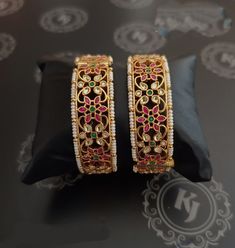 Real Kundan Bangle pair  This is Gold Finish Kundan Bangles Pair. It's Perfect for Wedding Occasion as well as Unique and Ethnic Traditional Bangle to gift and Also Bridal wear to match with Wedding Outfits. Made up from Copper material. * Our all jewelry is made from semiprecious stones and beads. Care Tip - 1. Keep away from moisture and perfume 2. Store in cotton or zip lock bags or air tight boxes. 3. Spot cleaning only. About us: kundanjewelsbyshiv is a pioneer firm in the semi-precious jew Jadau Kada, Kundan Bangles, Wedding Girl, Semi Precious Jewelry, Adjustable Bangle, Copper Material, Wedding Outfits, Precious Jewelry, Jewelry Business