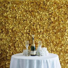 a table topped with two bottles of champagne