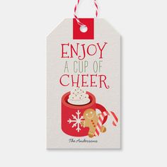 a christmas gift tag with the words enjoy a cup of cheer and a gingerbread