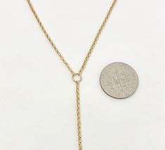 This long drop lariat is made from a delicate rolo chain. The chain is 14k gold fill, 14k rose gold fill, or sterling silver chain. The drop chain of the necklace measures 6 inches. If you want a longer or shorter drop chain, let me know in the comment section. The drop chain length is not included in the necklace length. LENGTH - Necklace on the model is 22 inches (the model's neck circumference is 12 inches). YOUR ORDER - Choose either gold fill or sterling silver in the drop-down menu. - Sele Cable Chain Lariat Necklace As A Gift, Gift Cable Chain Lariat Necklace, Lariat Chain Necklace With Cable Chain For Gifts, Minimalist Gold Lariat Necklace With Cable Chain, Dainty Gold Lariat Necklace With Teardrop Pendant, Dainty Lariat Necklace With Gold Chain, Dainty Gold Lariat Necklace, Dainty Gold Chain Lariat Necklace, Gold Lariat Necklace With Adjustable Teardrop Pendant