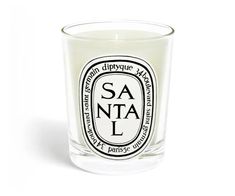 a candle that is sitting in front of a white background with the words chne on it