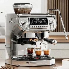 an espresso machine sitting on top of a wooden table