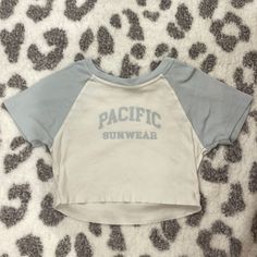 Never Worn Pacific Sunwear Cropped Tee. Size Small Sporty Cotton Crop Top For Beach, Casual Beach Crop Top With Crew Neck, Casual Crew Neck Crop Top For Beach, Casual Crew Neck Crop Top For Vacation, Casual Short Sleeve Crop Top For Beach Season, Cotton Crew Neck Crop Top For Vacation, Beach Season Cotton Short Sleeve Crop Top, Casual Crew Neck Crop Top For Beach Season, Cotton Short Sleeve Crop Top For Beach Season