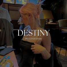 a woman sitting at a table in front of a plate with food on it and the words destiny above her