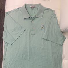 Nwot - Peter Millar Half Sleeve Golf Polo - Perfect Condition In Absolutely Beautiful Color - Super Light Comfortable Material - Excellent Quality That Peter Millar Is Known For. - Approximate Dimensions: Length: 30” Width: 24” Please Reach Out If You Have Any Questions. Order With Confidence, We Have More Than 99% 5star Reviews. Live Long And Prosper Solid Cotton Top For Golf, Cotton Tops For Golf, Casual Green Tops For Golf, Solid Cotton Golf Top, Green Cotton Tops For Golf, Green Cotton Golf Tops, Green Cotton Golf Shirt, Peter Millar Men Golf, Graphic Print Polo Collar T-shirt For Golf