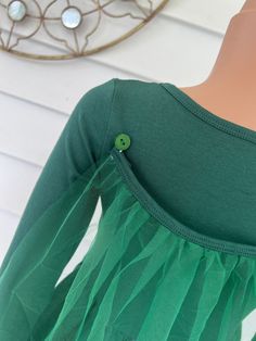 Inspired by Hocus Pocus witch Winnie Sanderson, this girl's dress is soft and easy to wear. It comes with a detachable tulle cape. Velvet cape is sold separately. Long Sleeve Fall Costume Dress, Green Long Sleeve Christmas Dress, Long Sleeve Cotton Dress For Costume Party, Green Long Sleeve Dress For Dress-up, Green Cotton Party Dress, Winnie Sanderson, Hocus Pocus Witches, Tulle Cape, Outfit For Kids