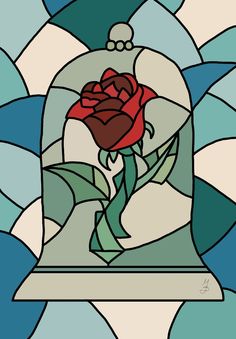 a stained glass window with a red rose in it