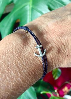 Simple and easy to wear deep ocean blue anchor bracelet. Adjustable, great for men and women. Handmade with care.  perfect for sailors, surfers, ocean lovers and watermen and waterwomen 💙 the cord is 100% waterproof so leave on to swim and surf! comfortable and easy to wear PLEASE MESSAGE ME FOR LARGER QUANTITY OR DIFFERENT COLORS OR SIZES!  SEE ALL MY BRACELETS AND ANKLETS HERE: https://www.etsy.com/shop/LOphoto808?ref=l2-shopheader-name§ion_id=19725982 please contact me here: https://www.etsy Adjustable Nautical Jewelry For Beach, Nautical Style Adjustable Jewelry For Beach, Adjustable Blue Nautical Bracelets, Adjustable Blue Nautical Bracelet, Casual Navy Bracelets For Gifts, Casual Navy Bracelet As A Gift, Navy Nautical Adjustable Bracelets, Adjustable Navy Nautical Bracelet, Navy Adjustable Nautical Bracelet